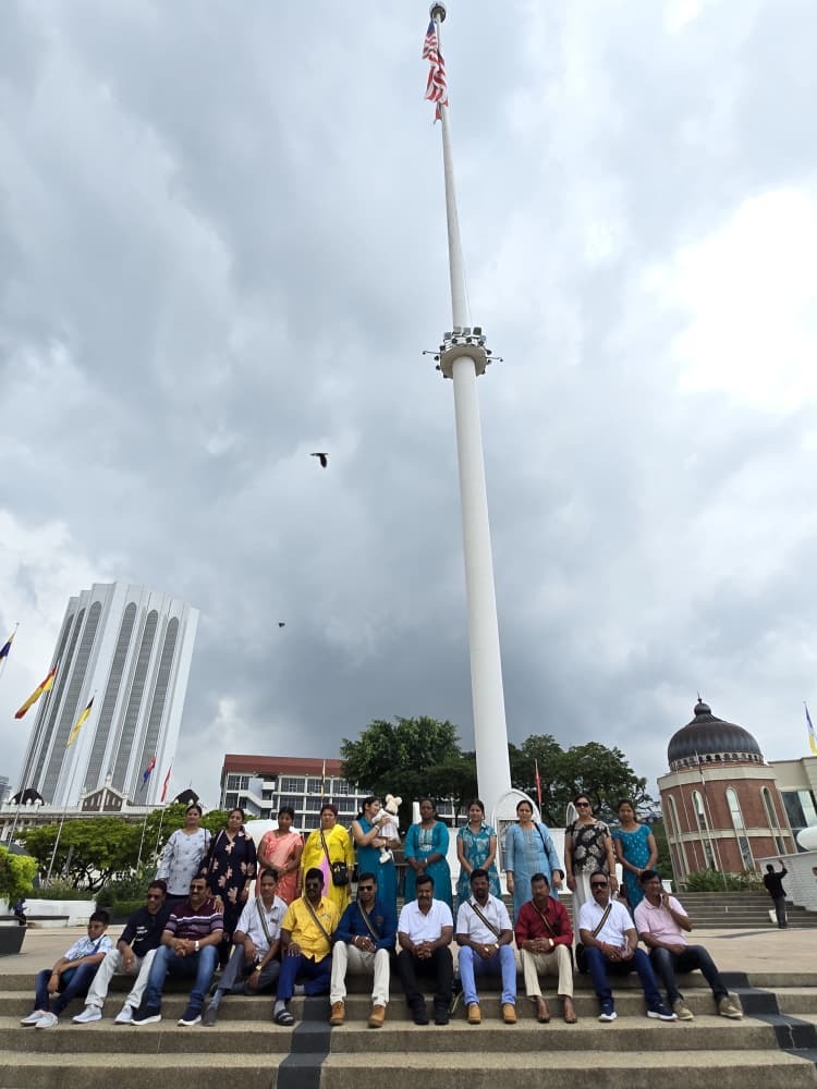 KSR Tours clients at Merdeka Square flagpole